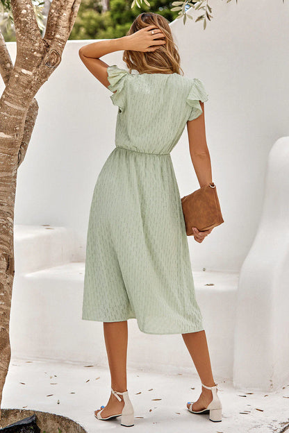 Luchtige Zomerjurk met Elegante V-hals en Subtiele Ruches
