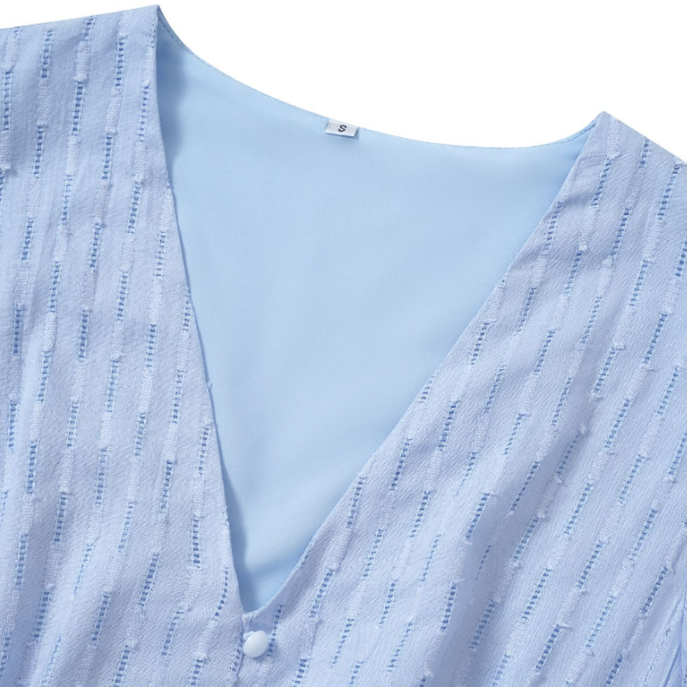 Luchtige Zomerjurk met Elegante V-hals en Subtiele Ruches
